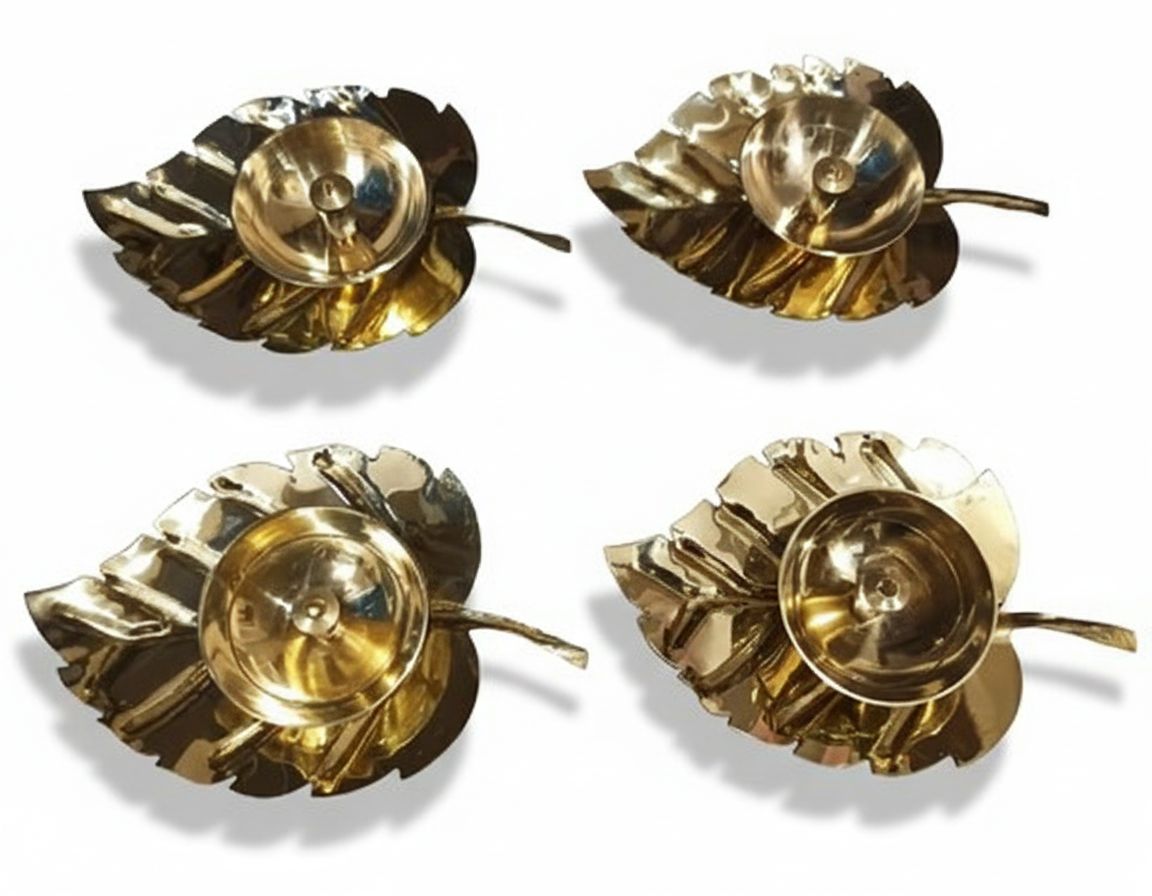 Product Type Brass Diya, Leaf Shaped Deepam, Brass Oil Lamp, Brass Deepak, Leaf Diya Holder Material/Style Solid Brass Diya, Golden Leaf Candle Holder, Handmade Brass Pooja Item, Traditional Indian Diya Theme/Use Diwali Decoration Items, Pooja Room Decor, Festival Lighting, Mandir Deepam, Auspicious Gift Regional Names Brass Deepam, Vilakku, Aarti Diya, Deepavali Decoration